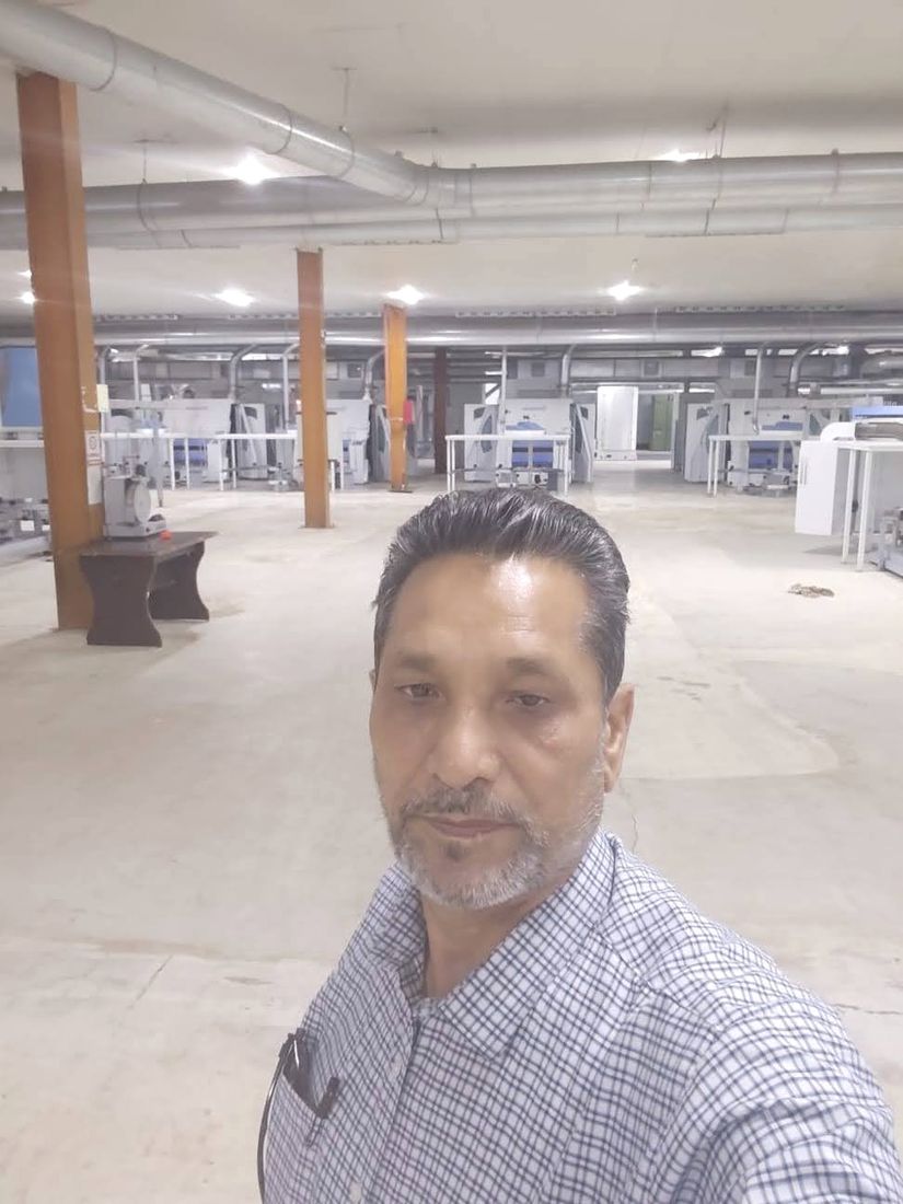 Abdul Rasheed Gill in an empty mill hall